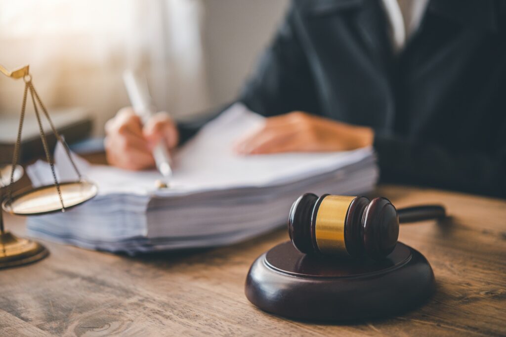 Law theme, mallet of the judge, law enforcement officers, evidence-based cases